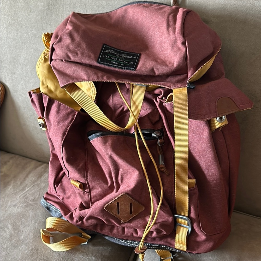 Eddie Bower Red and Yellow traveling Backpack. Comfortable for backpacking.